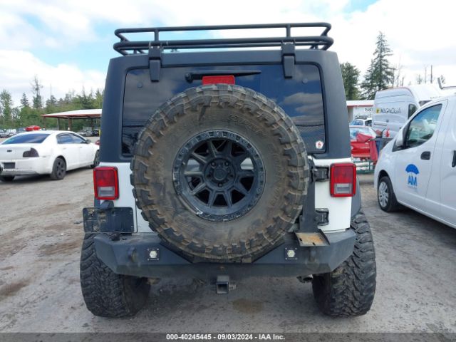 1C4BJWDG2GL301166 Jeep Wrangler Unlimited Sport