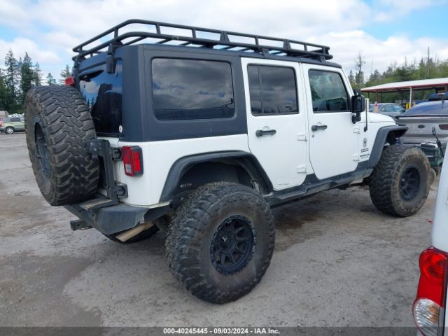1C4BJWDG2GL301166 Jeep Wrangler Unlimited Sport