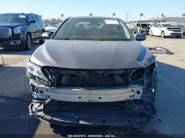 4T1C31AKXLU527031 Toyota Camry Le Hybrid