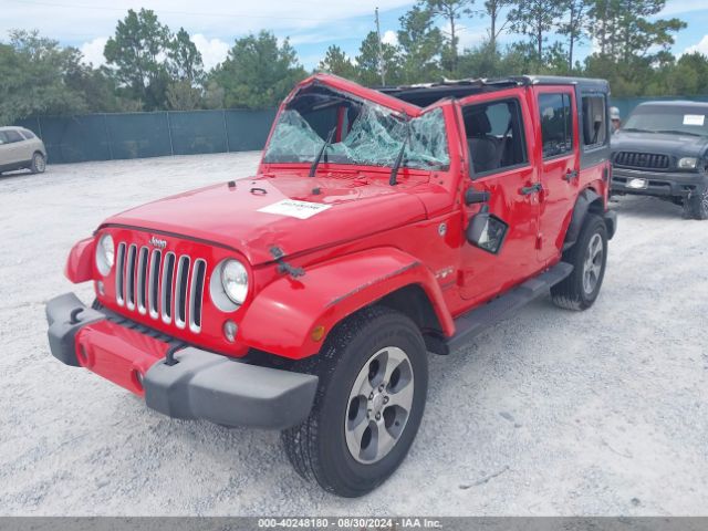 1C4BJWEG9GL305438 Jeep Wrangler Unlimited Sahara