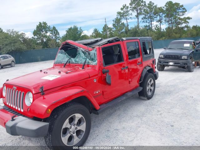 1C4BJWEG9GL305438 Jeep Wrangler Unlimited Sahara