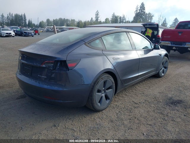 2023 TESLA MODEL 3 5YJ3E1EB2PF667694 Photo 3