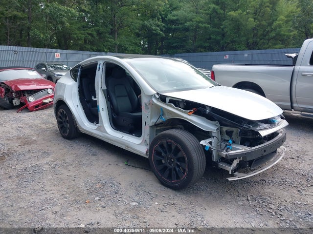 2023 TESLA MODEL Y 7SAYGDEE0PA059930 Photo 0