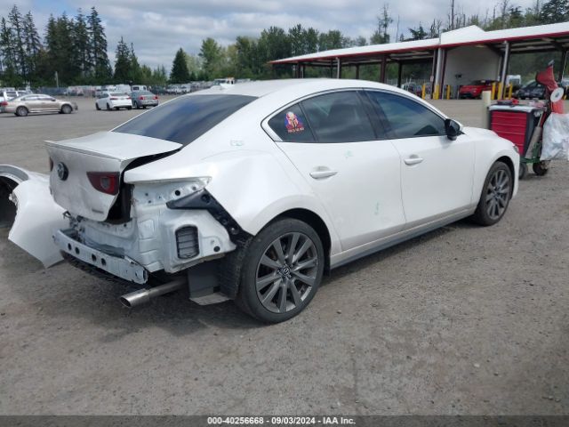 JM1BPBDL4M1314786 Mazda Mazda3 Premium