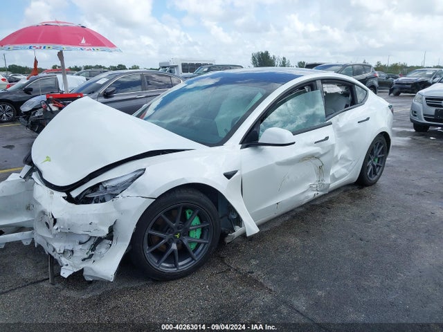 2023 TESLA MODEL 3 5YJ3E1EAXPF424769 Photo 1