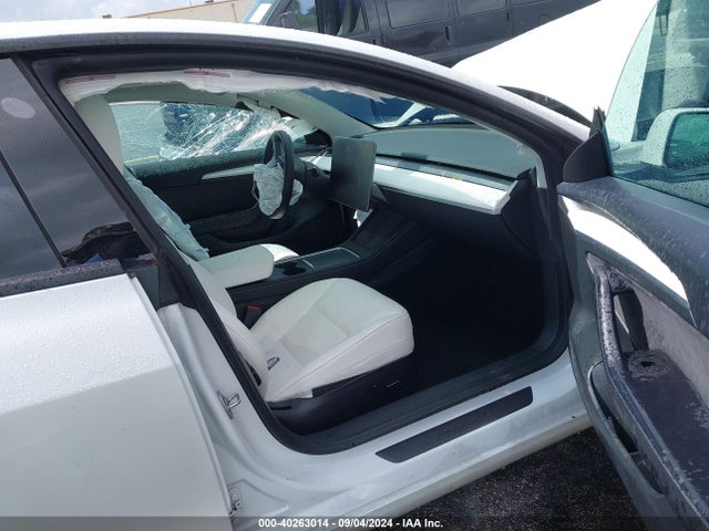 2023 TESLA MODEL 3 5YJ3E1EAXPF424769 Photo 4