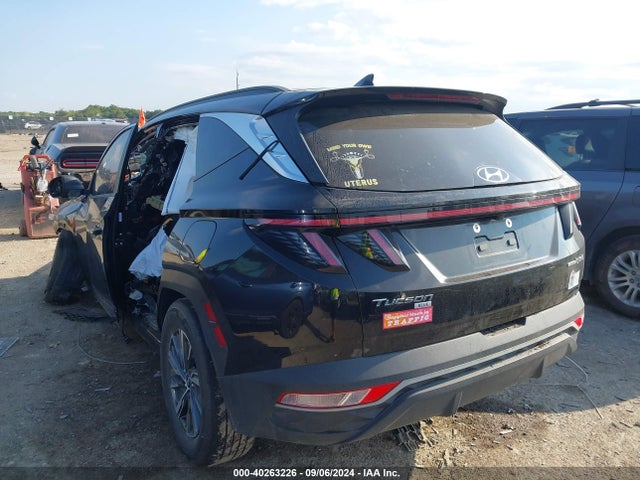 KM8JBCA17NU017395 Hyundai Tucson Hybrid Blue