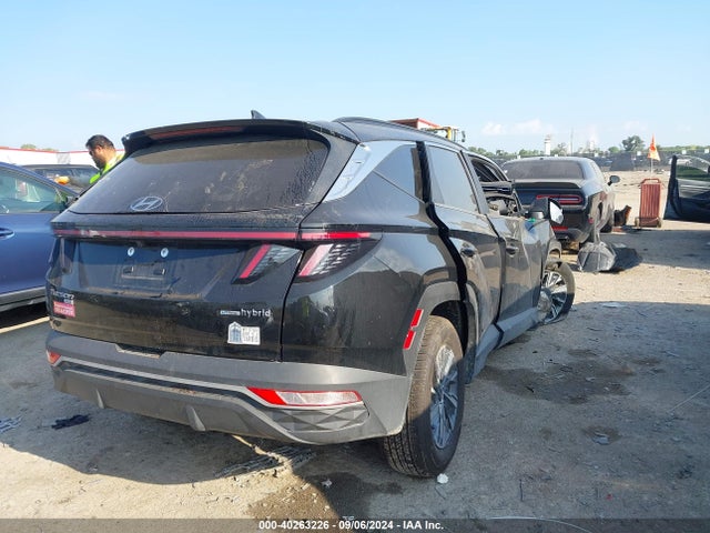 KM8JBCA17NU017395 Hyundai Tucson Hybrid Blue