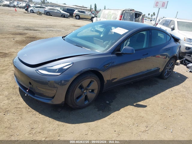 2023 TESLA MODEL 3 5YJ3E1EB5PF700106 Photo 1