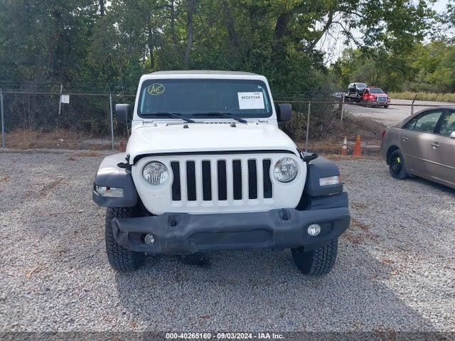 1C4HJXDG5JW150717 Jeep Wrangler Unlimited Sport 4x4