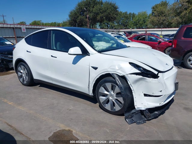 2024 TESLA MODEL Y 7SAYGDEE0RA280527 Photo 0