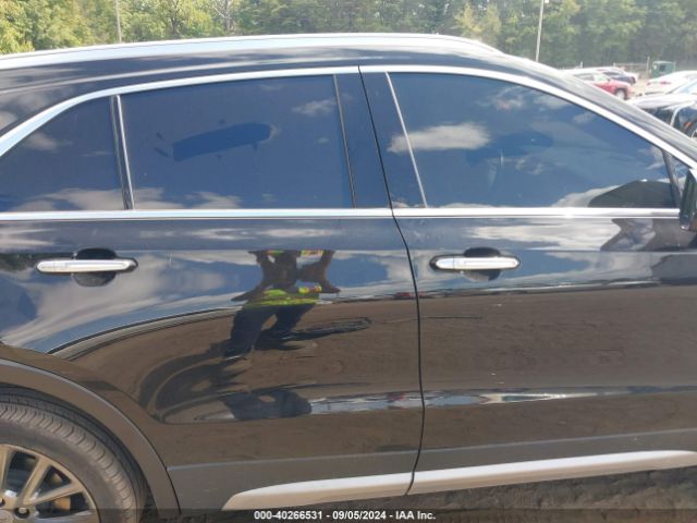 1GYFZDR48KF120569 Cadillac Xt4 Premium Luxury