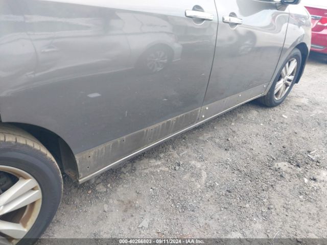 JN8AE2KP4E9107880 Nissan Quest Sl