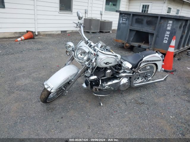 2010 HARLEY-DAVIDSON FLSTC 1HD1BW512AB034755 Photo 1