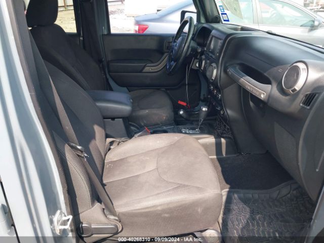 1C4BJWDG1EL305223 Jeep Wrangler Unlimited Sport