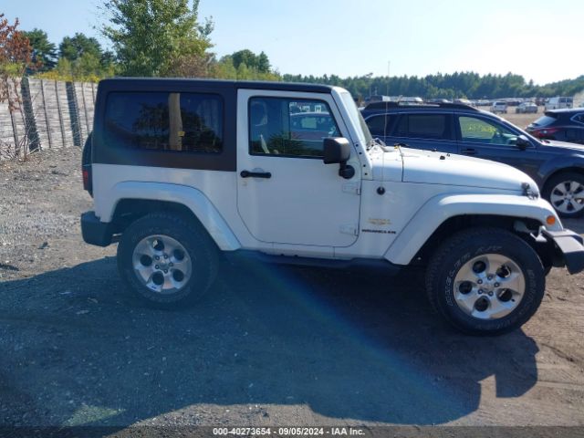 1C4AJWBG1EL258595 Jeep Wrangler Sahara