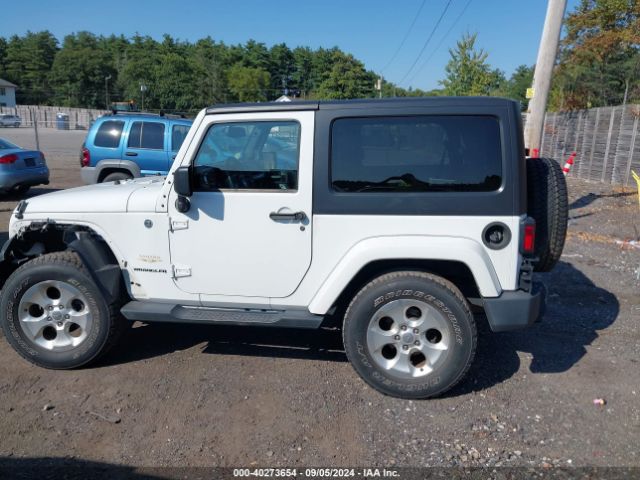 1C4AJWBG1EL258595 Jeep Wrangler Sahara