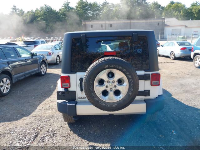 1C4AJWBG1EL258595 Jeep Wrangler Sahara