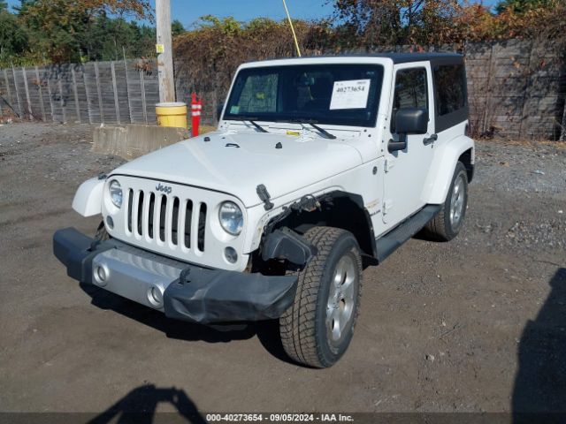 1C4AJWBG1EL258595 Jeep Wrangler Sahara