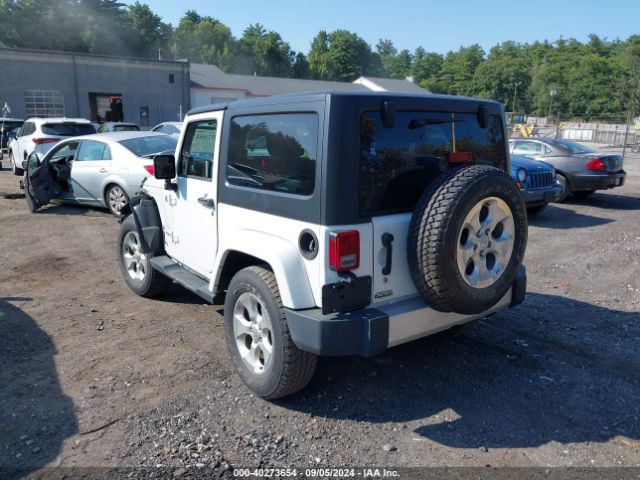 1C4AJWBG1EL258595 Jeep Wrangler Sahara