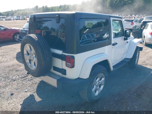 1C4AJWBG1EL258595 Jeep Wrangler Sahara