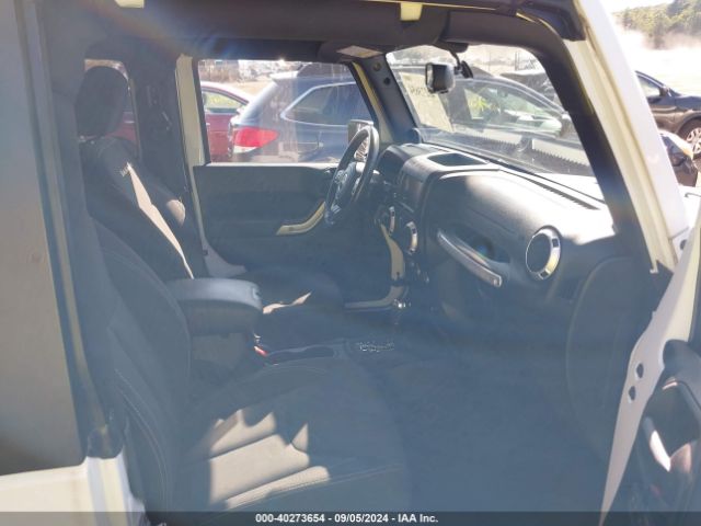 1C4AJWBG1EL258595 Jeep Wrangler Sahara