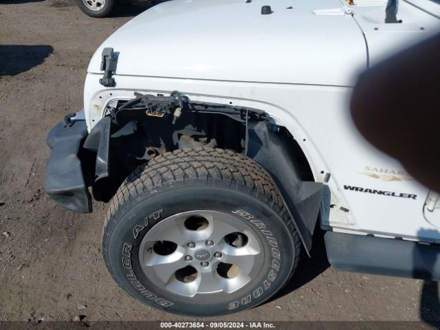 1C4AJWBG1EL258595 Jeep Wrangler Sahara