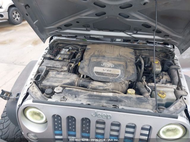 1C4BJWDG9EL177779 Jeep Wrangler Unlimited Sport