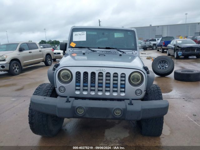 1C4BJWDG9EL177779 Jeep Wrangler Unlimited Sport
