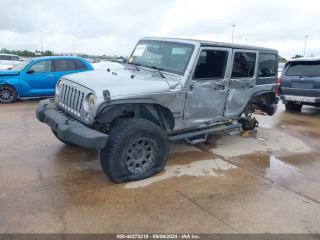 1C4BJWDG9EL177779 Jeep Wrangler Unlimited Sport