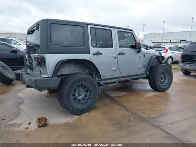 1C4BJWDG9EL177779 Jeep Wrangler Unlimited Sport