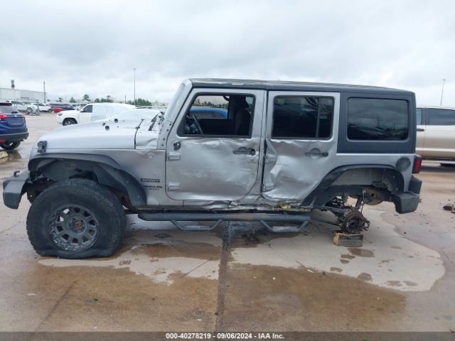1C4BJWDG9EL177779 Jeep Wrangler Unlimited Sport