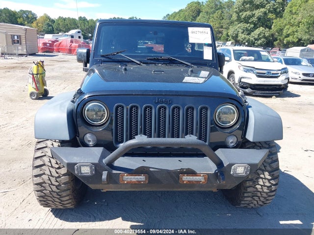 1C4BJWDG0EL239618 Jeep Wrangler Unlimited Sport