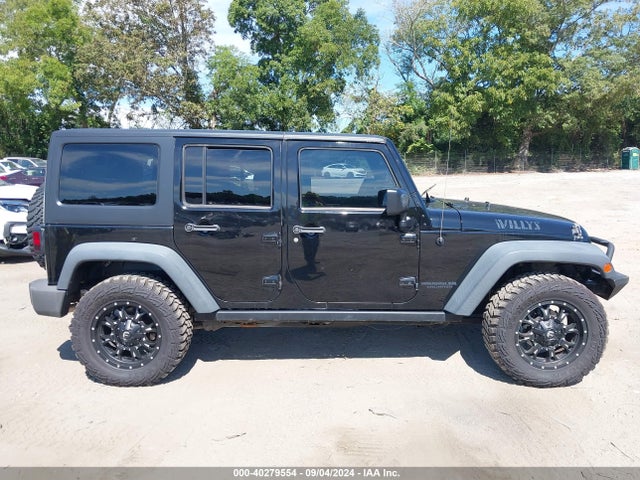 1C4BJWDG0EL239618 Jeep Wrangler Unlimited Sport