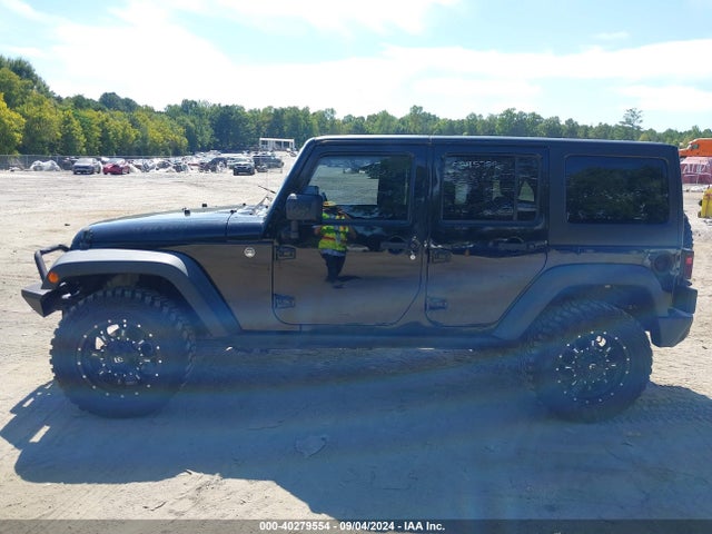 1C4BJWDG0EL239618 Jeep Wrangler Unlimited Sport