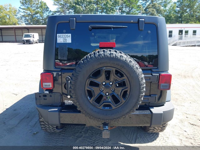 1C4BJWDG0EL239618 Jeep Wrangler Unlimited Sport