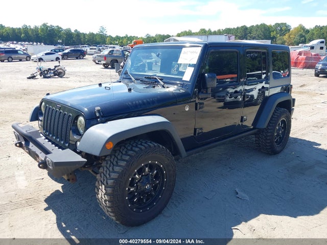 1C4BJWDG0EL239618 Jeep Wrangler Unlimited Sport
