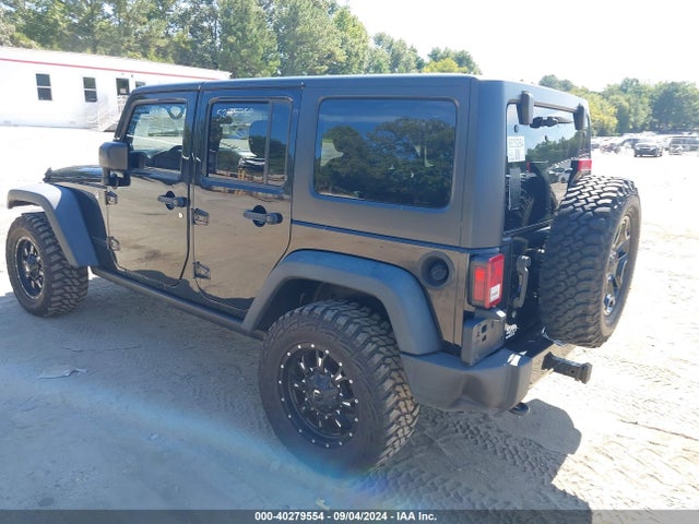 1C4BJWDG0EL239618 Jeep Wrangler Unlimited Sport