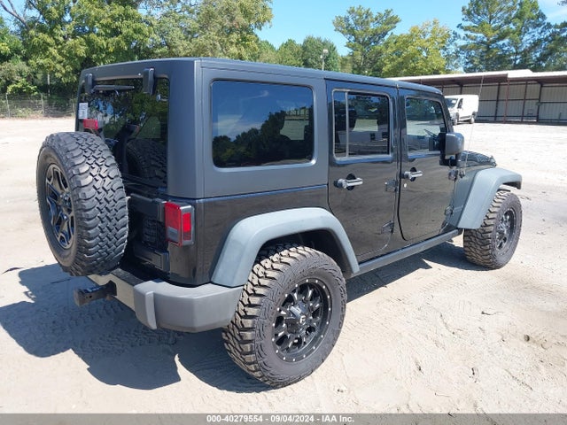 1C4BJWDG0EL239618 Jeep Wrangler Unlimited Sport