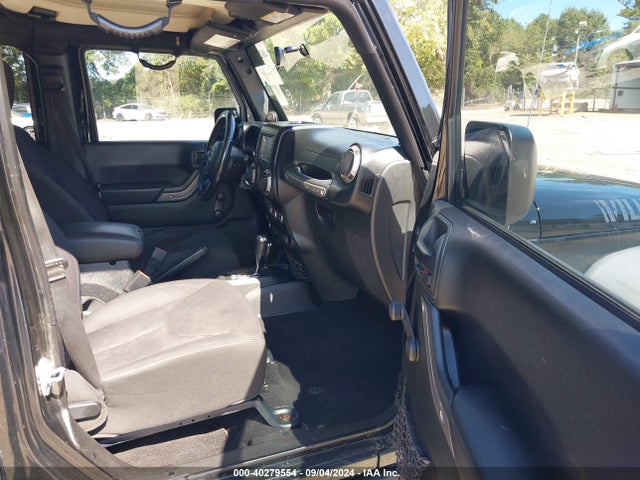 1C4BJWDG0EL239618 Jeep Wrangler Unlimited Sport