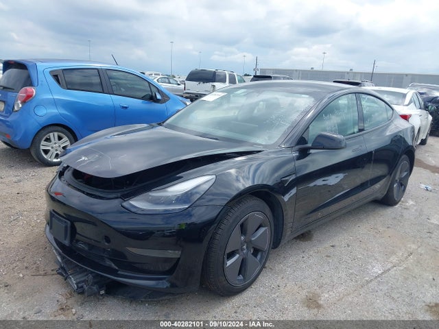 2023 TESLA MODEL 3 5YJ3E1EA8PF433812 Photo 1