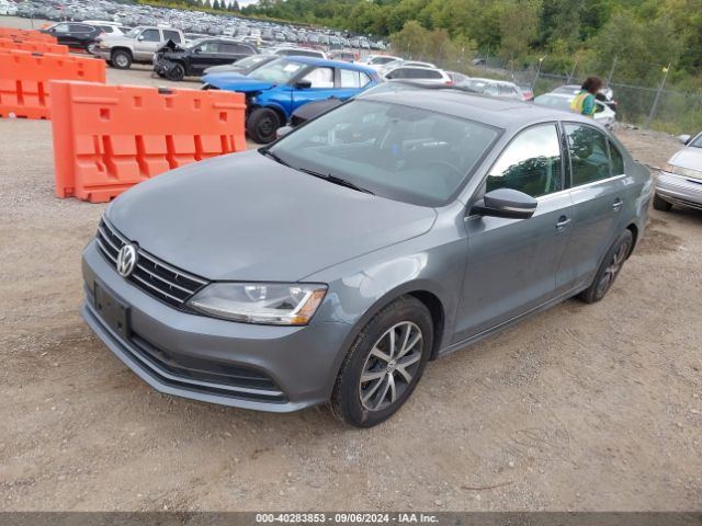 3VWDB7AJ1JM245915 Volkswagen Jetta 1.4t Se/1.4t Wolfsburg Edition
