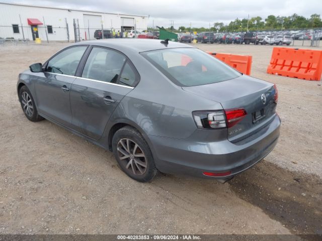 3VWDB7AJ1JM245915 Volkswagen Jetta 1.4t Se/1.4t Wolfsburg Edition