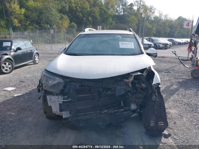 JTMRJREV7GD016910 Toyota Rav4 Hybrid Xle