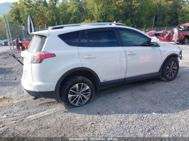 JTMRJREV7GD016910 Toyota Rav4 Hybrid Xle