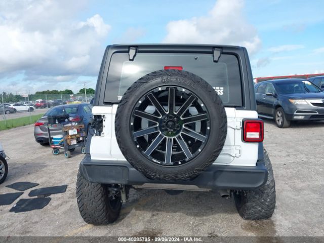 1C4HJXDGXKW583015 Jeep Wrangler Unlimited Sport 4x4