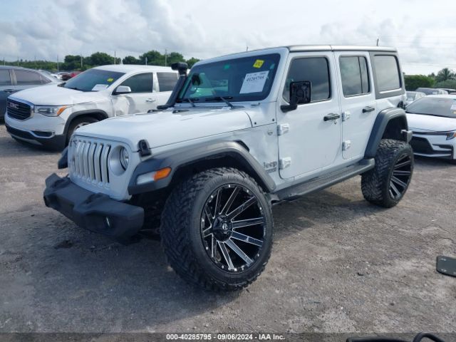 1C4HJXDGXKW583015 Jeep Wrangler Unlimited Sport 4x4