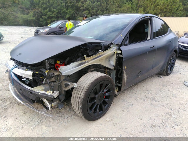 2023 TESLA MODEL Y 7SAYGDEF1PF596642 Photo 1