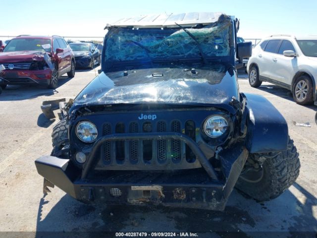1C4BJWEG1EL135914 Jeep Wrangler Unlimited Sahara
