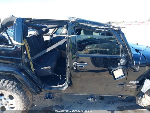 1C4BJWEG1EL135914 Jeep Wrangler Unlimited Sahara